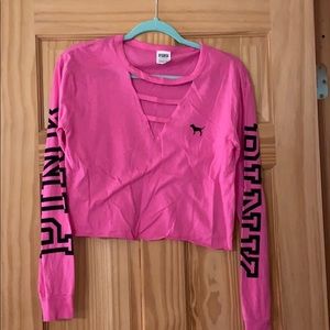 Pink crop top with cuts in the front